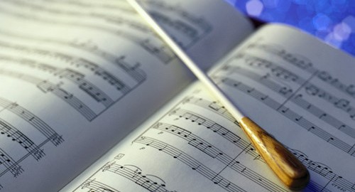 Conductor's Baton and Sheet Music --- Image by © Royalty-Free/Corbis